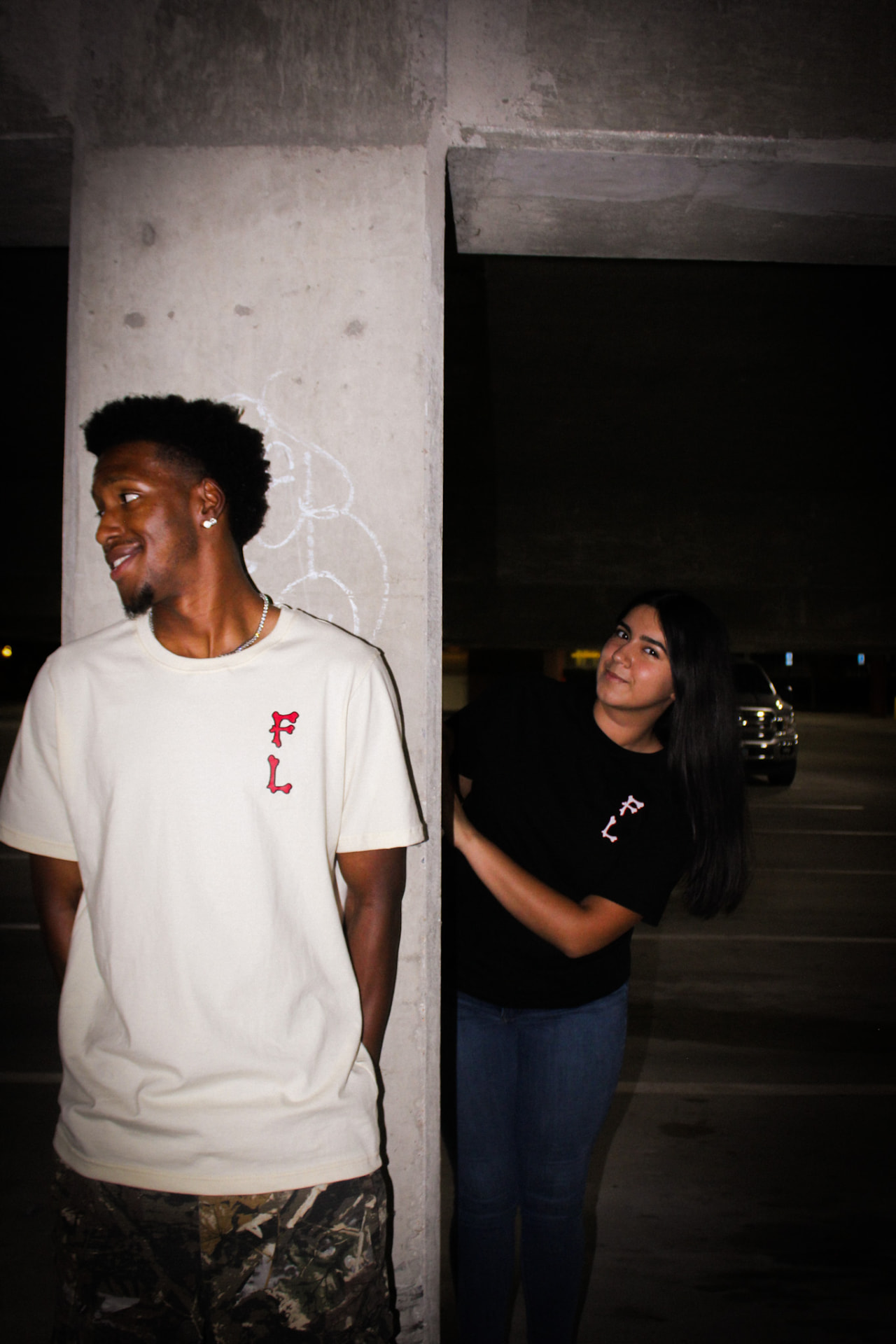 Crème and black F8VRLASTING tees with the red FL chest print